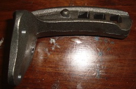 Auger bracket - ductile iron casting.